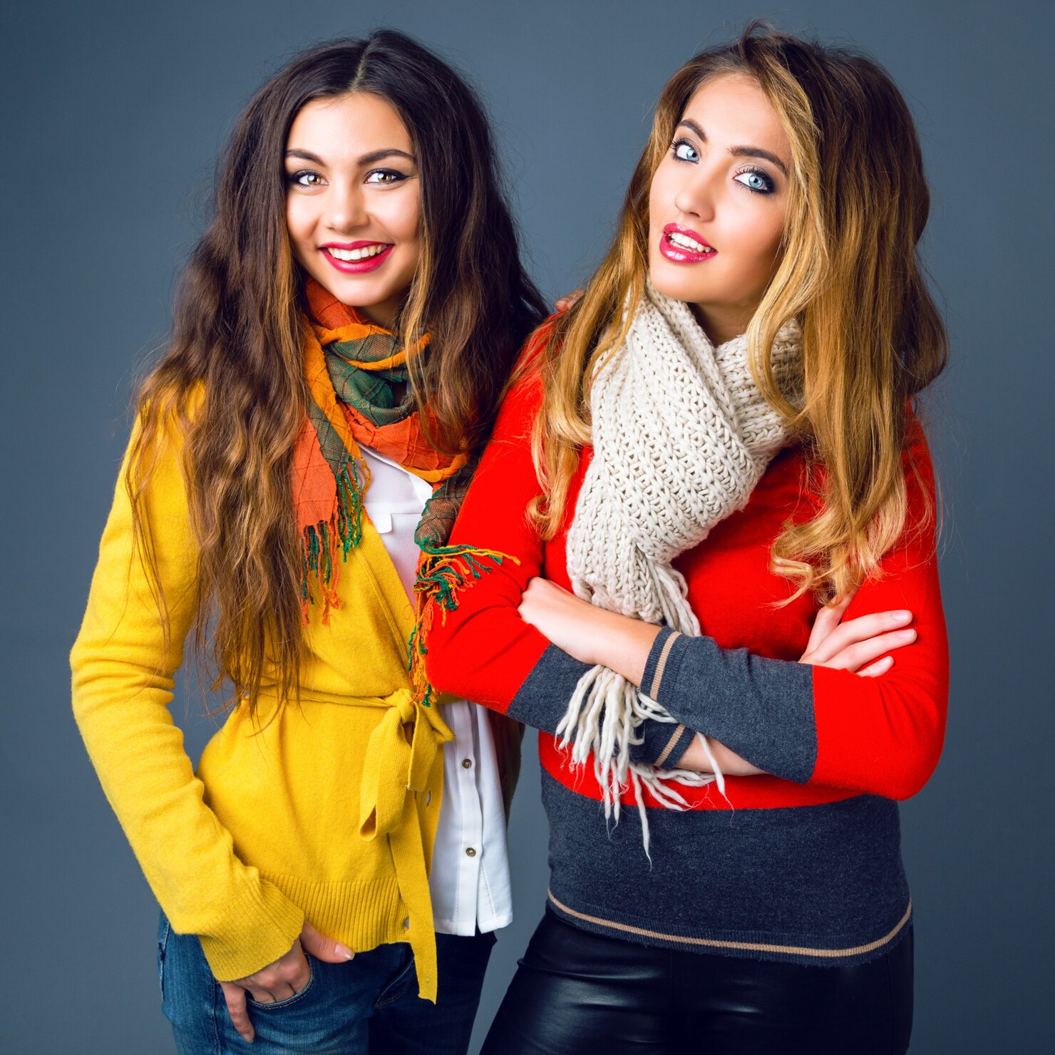 fashion winter portrait blonde brunette beautiful best friends girls hugs having fun wearing bright stylish cashmere sweaters scarfs have trendy makeup long amazing hairs 291049 569